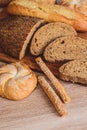 ÃÂ¡risp bread with buns. French baguettes. Fresh crispbread. Bread background. Different breed on wooden background.